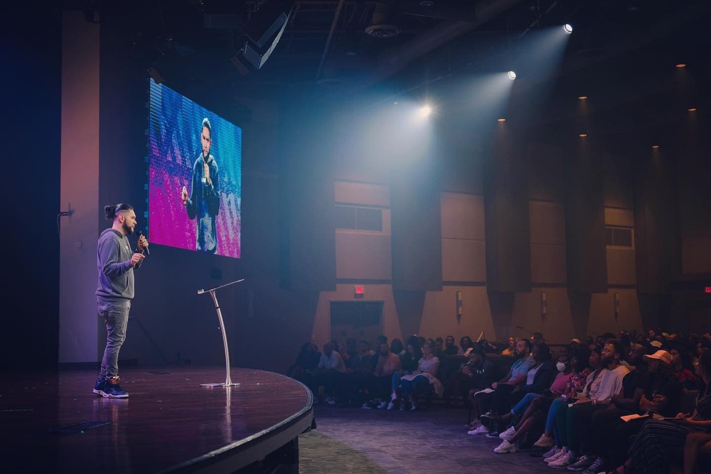 Omar speaking at a leadership event